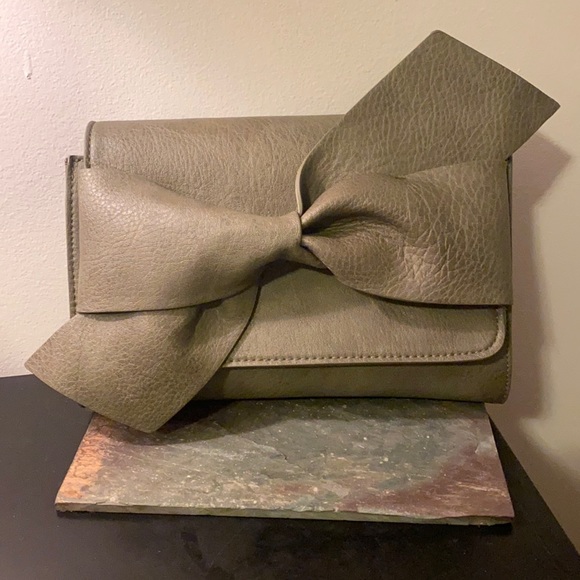 Anthropologie Handbags - Fatigue green knot-front clutch